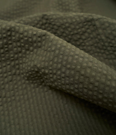 UNIVERSAL WORKS PLEATED TRACK PANT 34640 MERIDA SEERSUCKER OLIVE - Shoelosophy