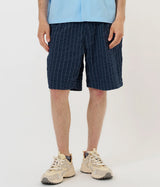 UNIVERSAL WORKS PLEATDED TRACK SHORT CHESTER STRIPE P34002 NAVY - Shoelosophy