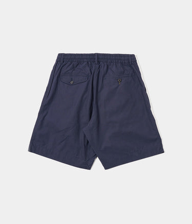 UNIVERSAL WORKS PLEATED TRACK SHORT 34151 PEACHED POPLIN NAVY – Shoelosophy