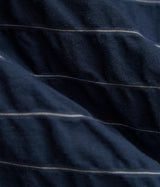 UNIVERSAL WORKS PLEATDED TRACK SHORT CHESTER STRIPE P34002 NAVY - Shoelosophy