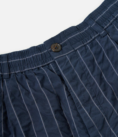 UNIVERSAL WORKS PLEATDED TRACK SHORT CHESTER STRIPE P34002 NAVY - Shoelosophy