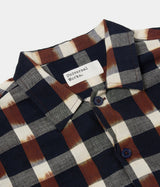 UNIVERSAL WORKS UTILITY SHIRT 31166 IKAT CHECK NAVY BRAUN - Shoelosophy