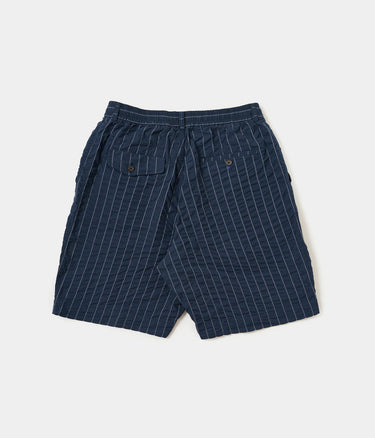 UNIVERSAL WORKS PLEATDED TRACK SHORT CHESTER STRIPE P34002 NAVY - Shoelosophy