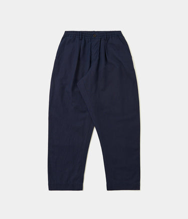 UNIVERSAL WORKS OXFORD HOSE LEINEN SLUB WEAVE P34027 NAVY - Shoelosophy