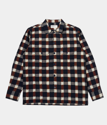 UNIVERSAL WORKS UTILITY SHIRT 31166 IKAT CHECK NAVY BROWN - Shoelosophy