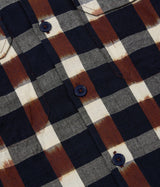 UNIVERSAL WORKS UTILITY SHIRT 31166 IKAT CHECK NAVY BRAUN - Shoelosophy