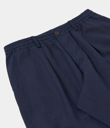 UNIVERSAL WORKS OXFORD HOSE LEINEN SLUB WEAVE P34027 NAVY - Shoelosophy