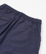 UNIVERSAL WORKS PLEATED TRACK SHORT 34151 PEACHED POPLIN NAVY - Shoelosophy